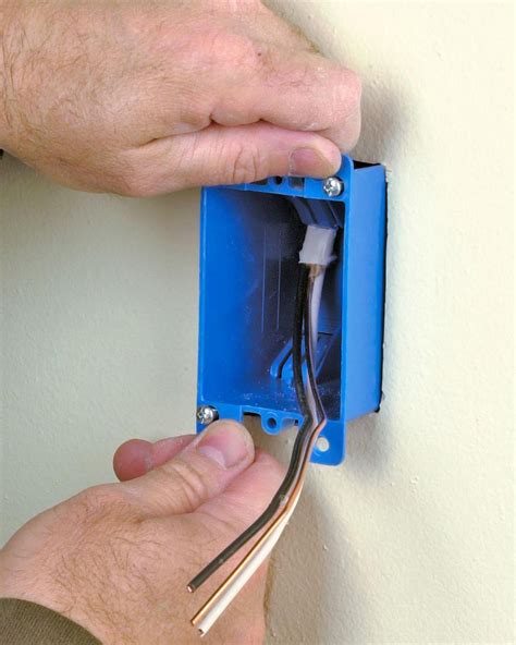 how to install a electric box in drywall|installing a new outlet box.